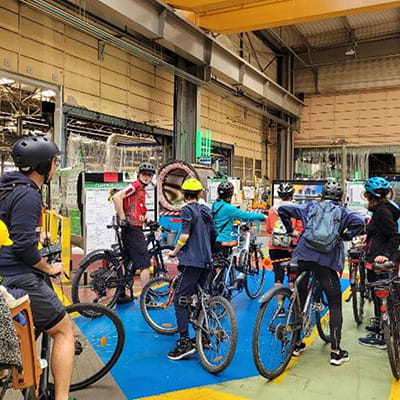 Bicycle tour inside a factory